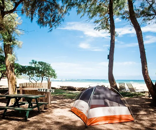 A tent on the beach at a campsite in Kauii.